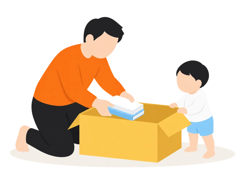 1. 段ボール箱に本などを入れて重くし、子どもの前に置きます。
