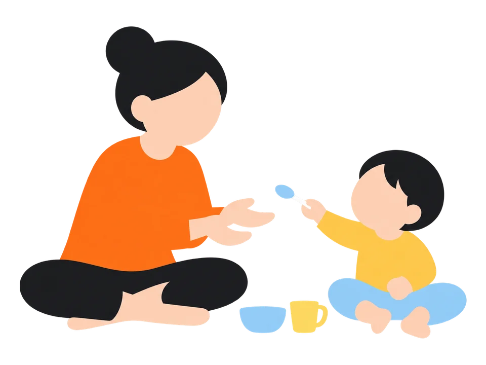2. 子どもがスプーンを差し出したら、「ありがとう、おいしい」と食べるまねで返します。
