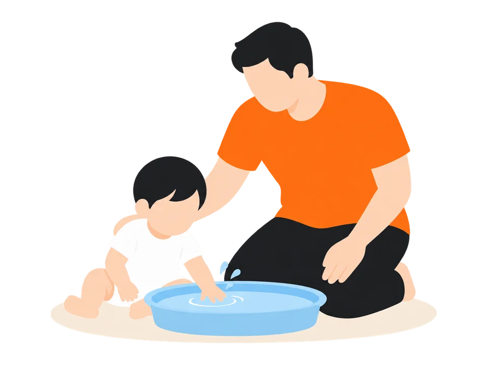 1. 洗面器に浅く水を入れて、お風呂場やシートの上に置きます。大人は子どものすぐ横に座ります。