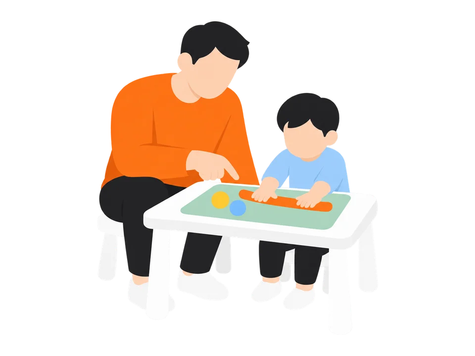 2. 子どもも同じようにこねます。手のひらで転がすと、細長い「へび」ができます。