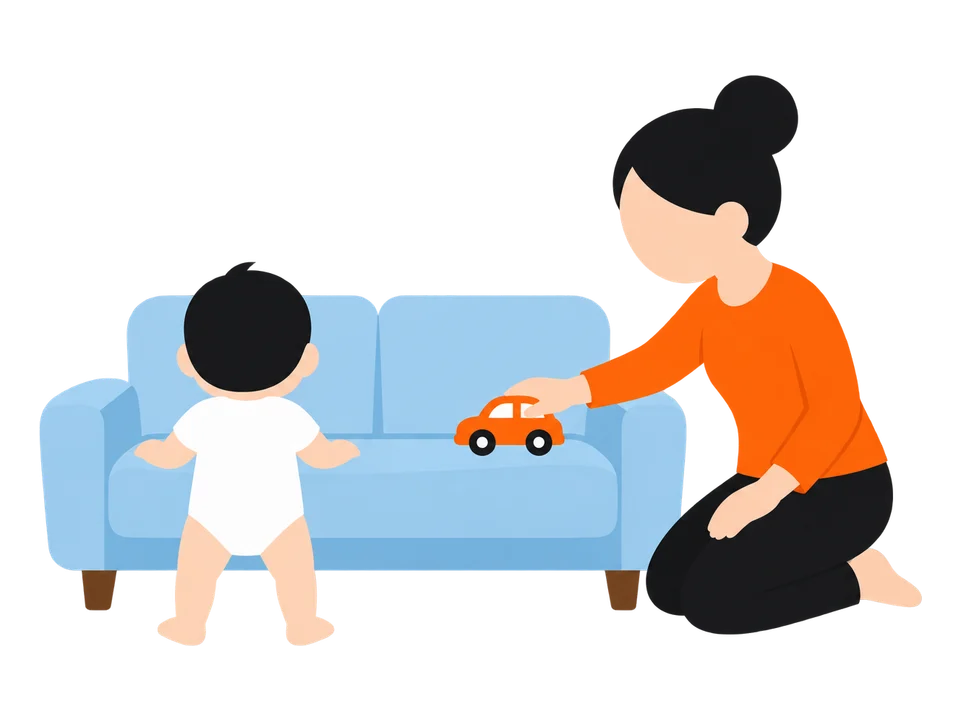 1. 安定したソファや低い台の端に、好きなおもちゃを置きます。
